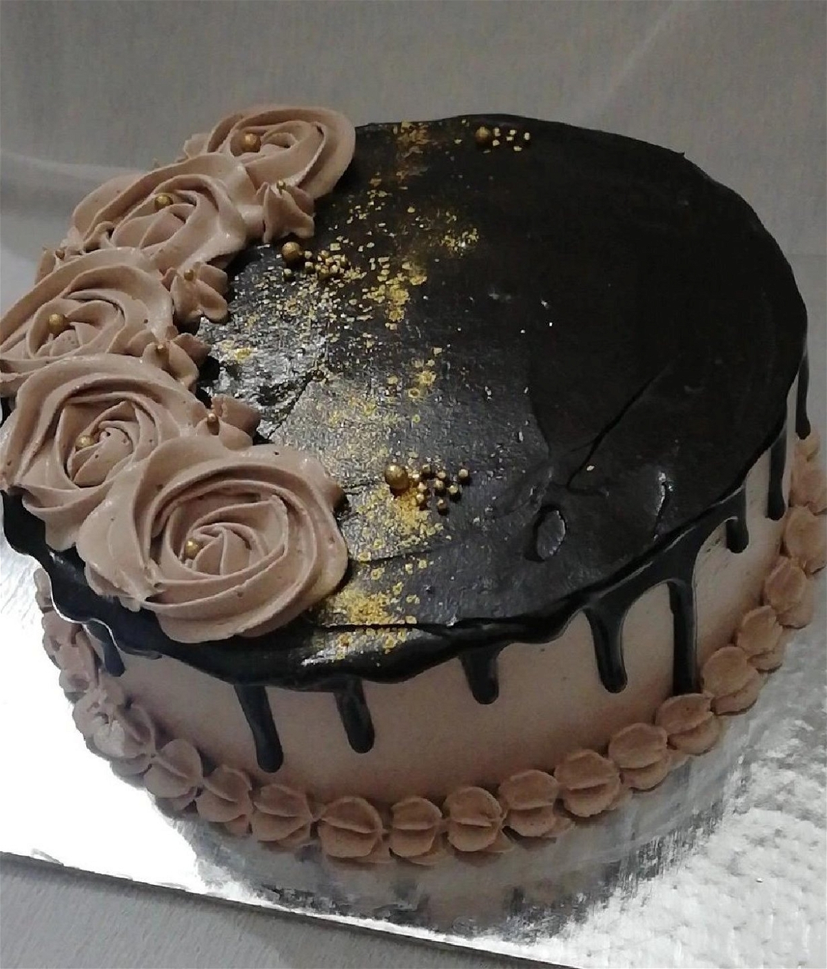 Deep Creamy Choclate Cake Topped With Golden Sprinkles And Semi Brown Flowers - 1 Pound